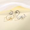 A Pair of Star and Moon Student Earrings, In A Simple Style. Star and Moon Earrings with The Same Luster Are Suitable for Daily Wear