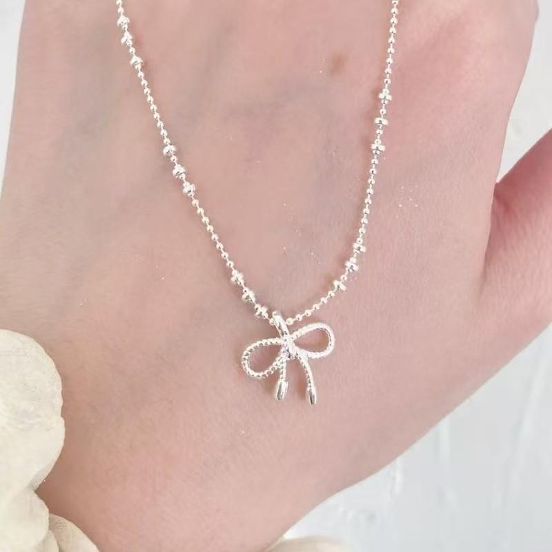

ANENJERY Ожерелье с подвеской-бантиком серебристого цвета для женщин и девушек, простое, роскошное, во французском стиле, ювелирные изделия, подарки, для вечеринки, оптом серебряный