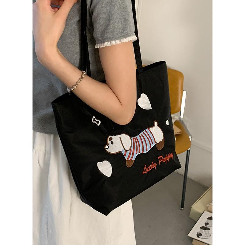 Canvas Bag Design Sense Niche Underarm Bag Women 2025 New Simple Cartoon Puppy Tote Bag Shoulder Bag Portable