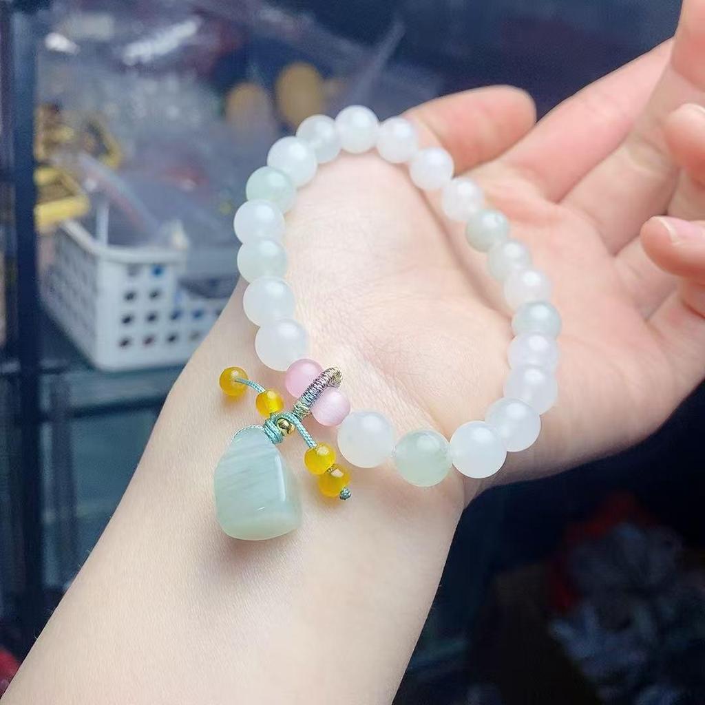 Tianshan Jade Wish-Fulfilling Ruyi Bracelet: Elegant, Unique Design for Women.