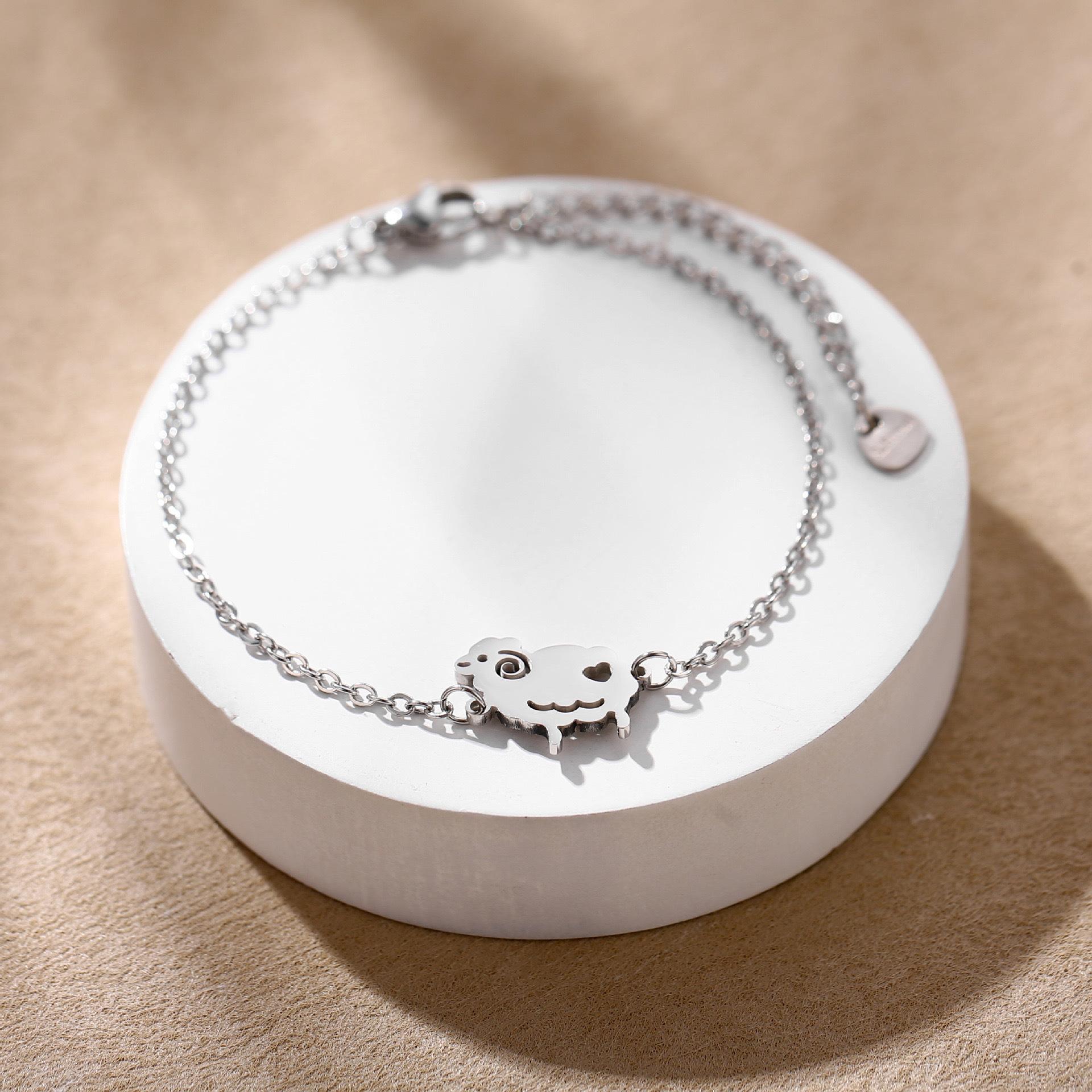 

Geometric Animal Bracelet Featuring Dog Cat Owl And Dolphin Charms Minimalist Fashion Jewelry