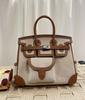 Italian Leather-Trimmed 25cm Cowhide Stitched Ladies' Handbag With Large Capacity Single Compartment And Detachable Shoulder Strap
