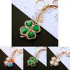Stylish Cat's Eye Four Leaf Clover Keyring In Various Colors For Fashionable Accessories And Thoughtful Gift-giving