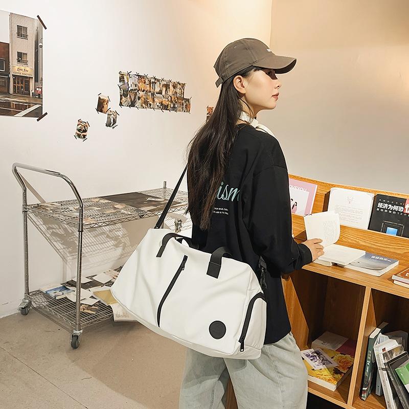 Travel bag Women's light travel handbag Short business trip Portable luggage bag Men's messenger sports fitness bag