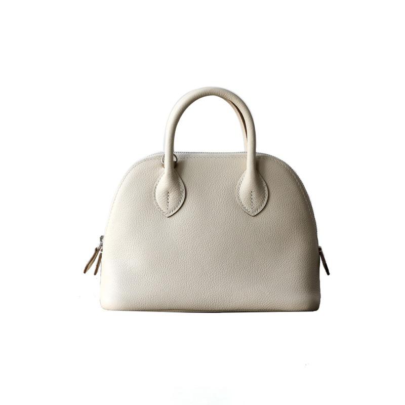 

Женская сумка-тоут из коровьей кожи первого слоя, нишевый дизайн высокого класса, сумка-ракушка, простая и универсальная сумка-мессенджер боулинг