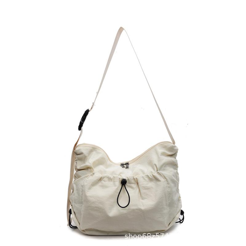 Large capacity canvas bag, women's versatile casual lazy style commuter bag, light pleated single shoulder messenger tote bag