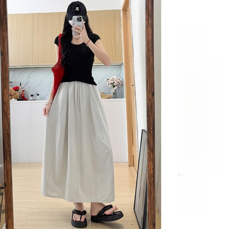 College Style Women A Line Skirt With Nylon Fabric And Tie Detail For Casual Wear