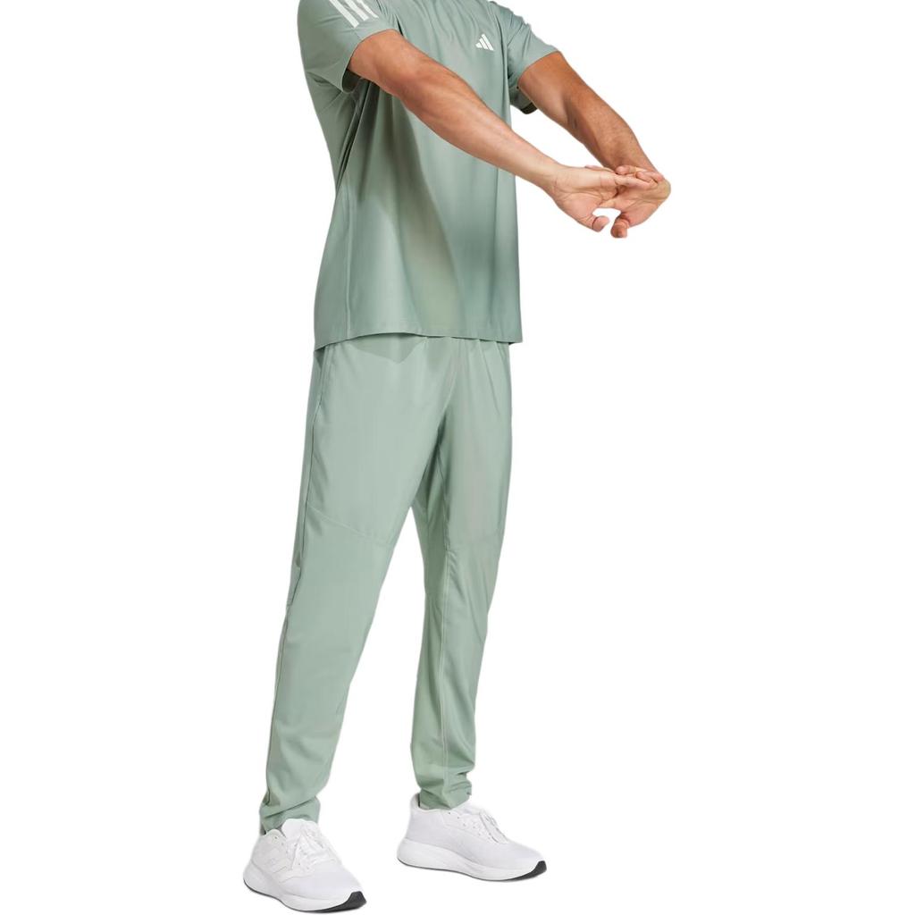 adidas Pantaloni Lunghi da Corsa da Uomo Own The Run con Tasca Laterale con Zip e Logo Elastico JD2247