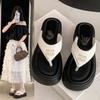 Increase the height of fashion and high sense of leisure beach pinch sandals 2025 summer new thick-soled flip-flops women's wear