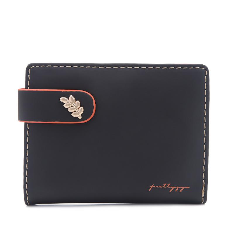 

Кошелек женский короткий стиль нишевая мода личность лист пряжка складная женская сумка чёрный