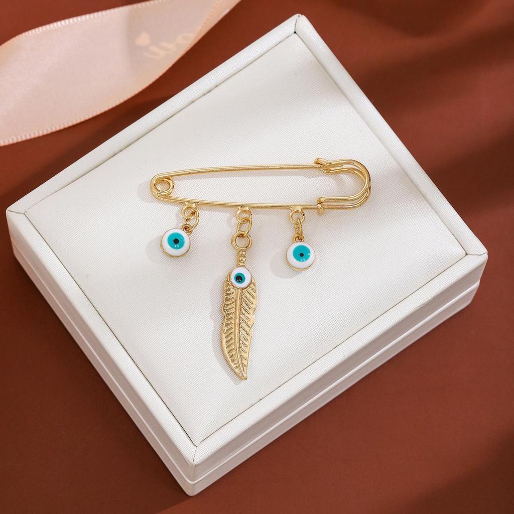 Creative Rhinestone Devil's Eye Tassel Brooch: Women's High-End Blue-Eyes Sweater Pin