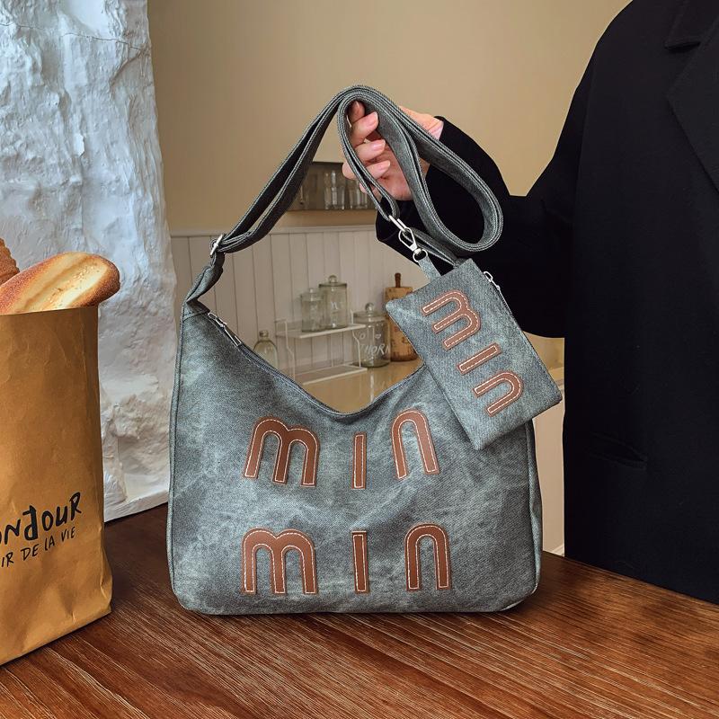 

Casual commuter retro large-capacity bag new denim fashion shoulder bag women s hand-held armpit bag чёрный