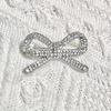 Women Brooch Bowknot Shape Anti-Rust Finish Shawl Clip with Faux Pearl Rhinestones Inlaid Sweaters Scarves Jackets Decorative Anti-exposure Pin