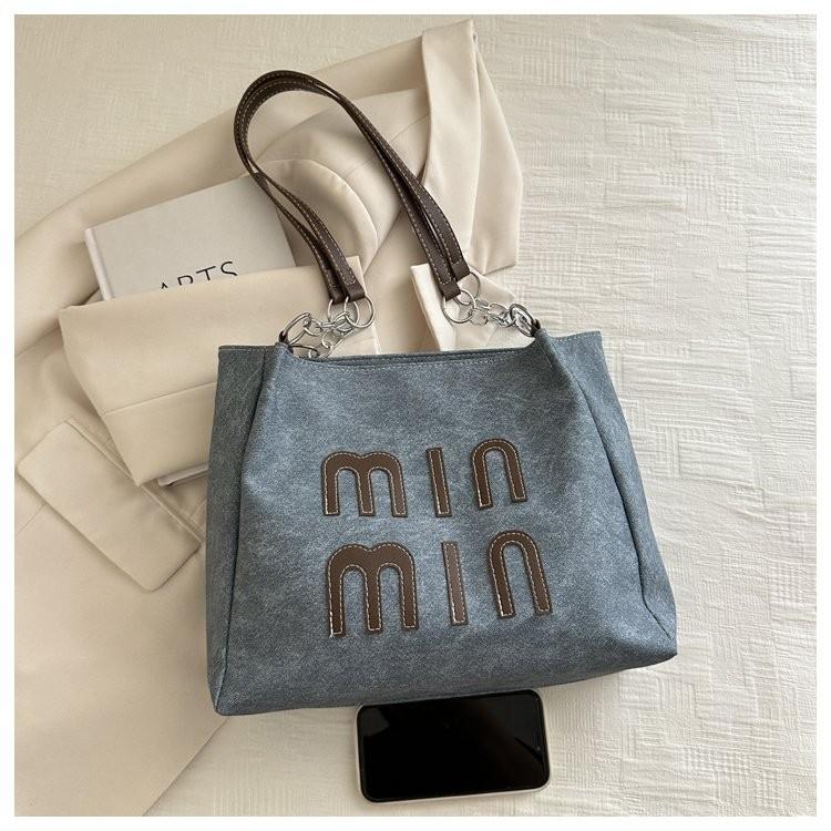 

Stylish Casual Black Gray Or Blue Cartoon Tote Bag For Everyday Use And Commuting синій