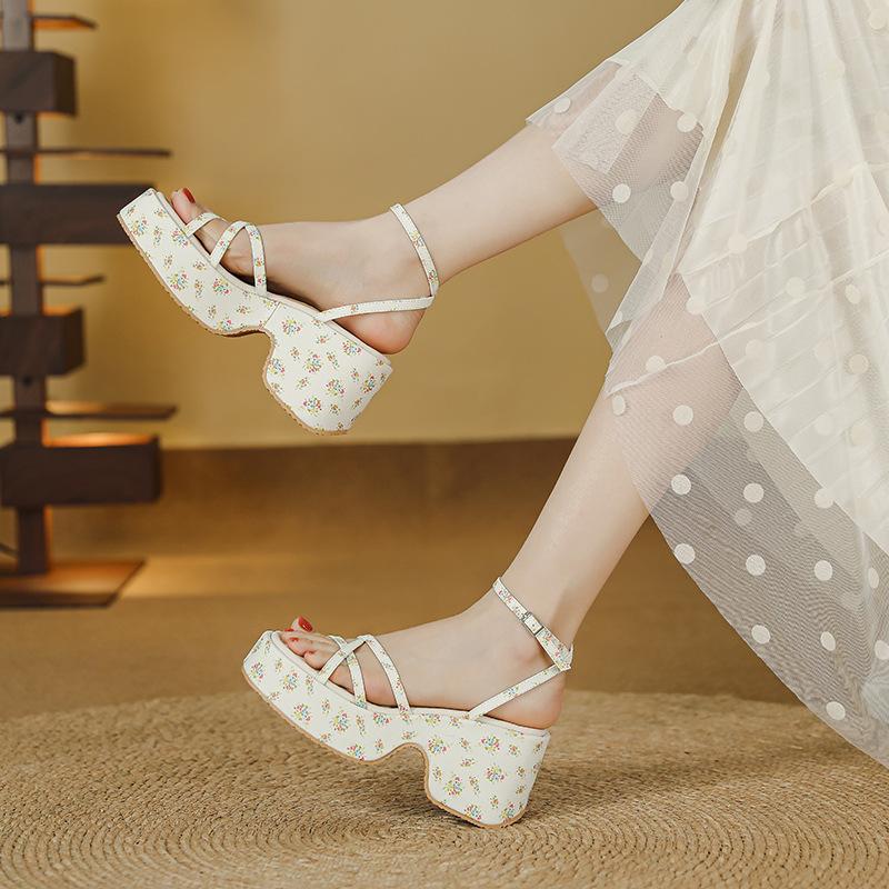 Sweet and cool wind thick-soled wedge sandals women's height increase 7cm muffin waterproof table one-word buckle belt summer new Roman shoes