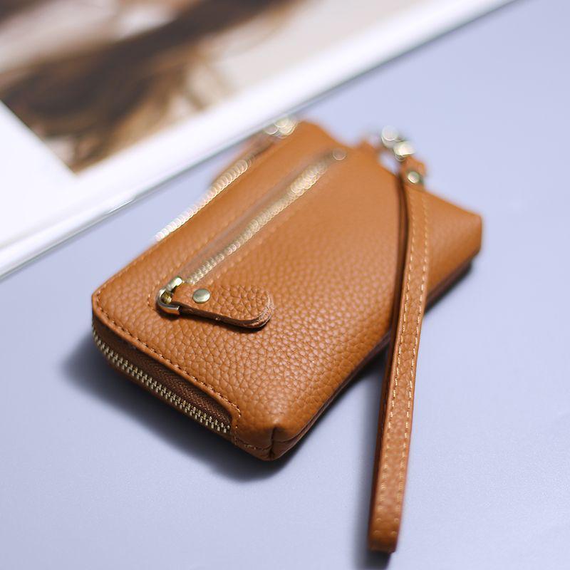 Women's Genuine Leather Coin Purse: Handheld Cowhide Wallet with Multi-Card Slots and Keychain