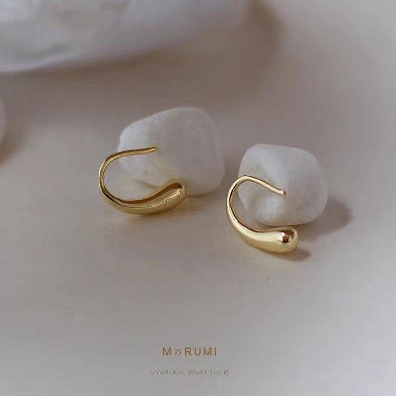 Chic French-Inspired Light Luxury Water Drop Earrings for Women - Trendy, Versatile, and Stylish.