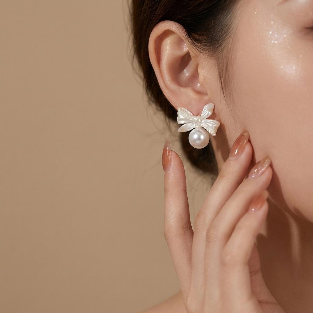 Gentle style mother-of-pearl butterfly bow earrings for women 9 Silver needle earrings offer a light luxury and sophisticated feel, suitable for