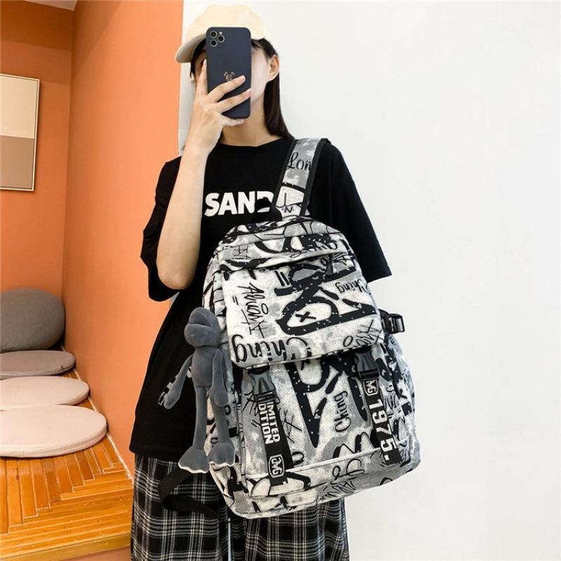 Mode Automne Cartable Personnalité Féminine Camouflage Graffiti Couple Sac à Dos Grande Capacité Sac à Dos Étudiant Masculin