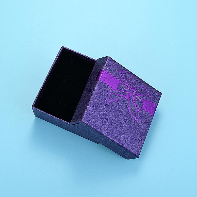 

All-in-One Jewelry Box: Bow-Stamped Box for Earrings, Rings, Bracelets, and Necklaces темно-фиолетового