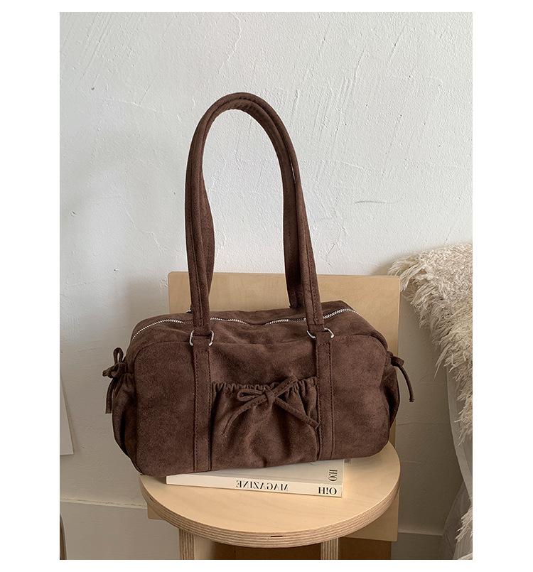 

Korean niche foreign casual shoulder bag women s new versatile simple fashion bow portable Boston bag