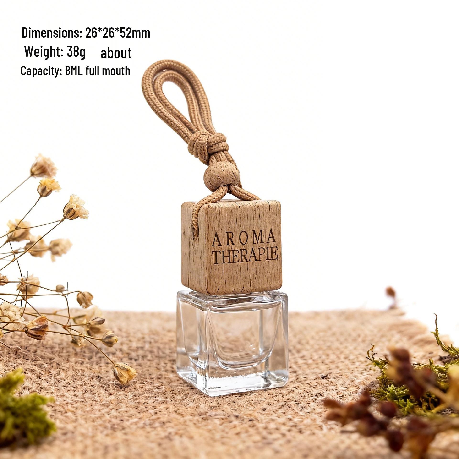 Car Air Freshener Pendant: Wooden Glass Essential Oil Bottle for Rearview Mirror.
