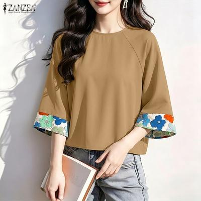 Blusa casual da donna a maniche 3/4 con scollo rotondo e dettaglio a contrasto