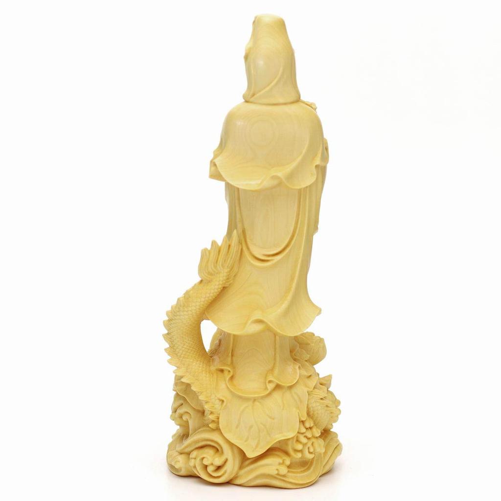 Kannon Buddhist approximately 17cm made of natural This wood carving depicts the dragon representing the Dragon Riding and is a symbol of protection