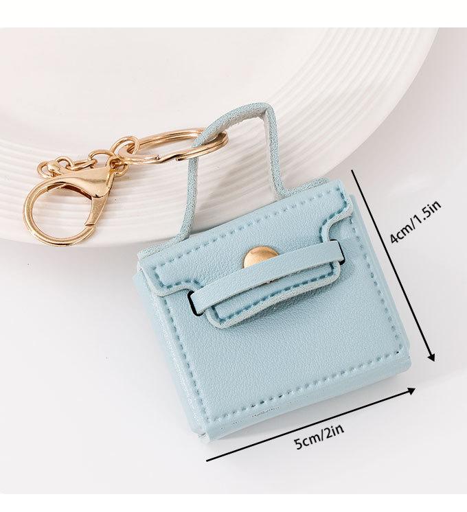 Cross-border solid color small square bag creative gift mouth red envelope keychain earphone bag car pu key chain pendant wholesale