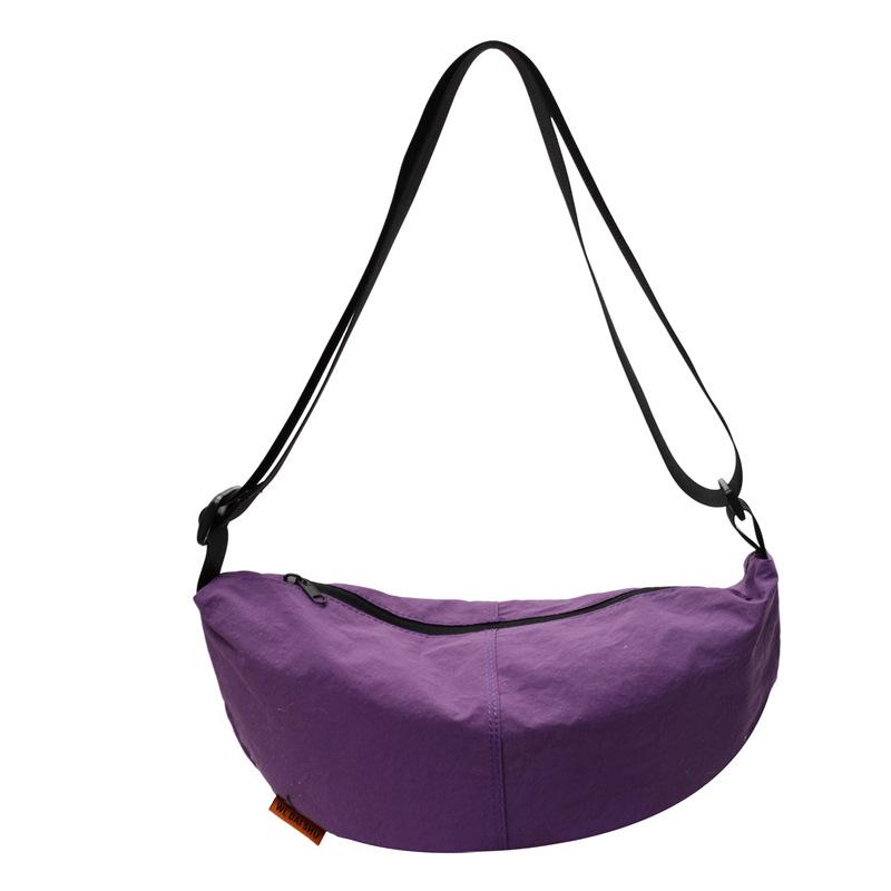 

2025 new casual style light and versatile sports dumpling bag niche design fashionable commuter travel messenger bag women фиолетовый