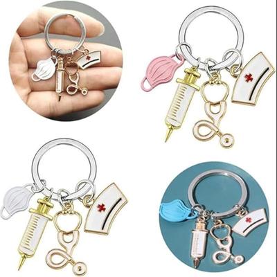 Breloc pentru asistentă Breloc pentru asistentă din metal cu seringă, capac pentru asistentă și stetoscop pentru cadouri pentru doctor la medicină, studentă, asistentă