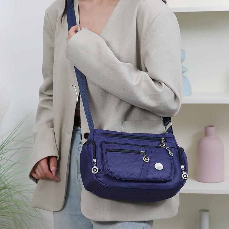 Bag Women's Large Capacity Shoulder Bag Waterproof and Wear Resistant Multi Pocket Commuter Leisure Outdoor Crossbody Bag