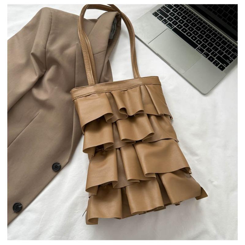 

New handbags are trendy, solid color personalized pleated shoulder bags, fashionable and versatile large-capacity bucket bags.
