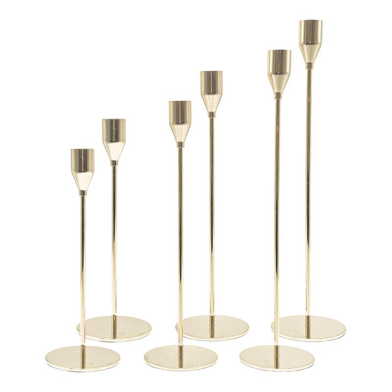 Elegant European Candle Holder Set: Electroplated Three-Piece Metal Ornament for High-End Dining and Wedding Décor.