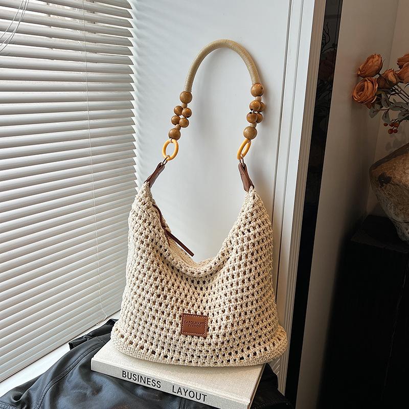 Holiday Style Woven Bag Women's New Knitted Hollow Shoulder Bag Fashionable Large-capacity Messenger Bag Beach Bag