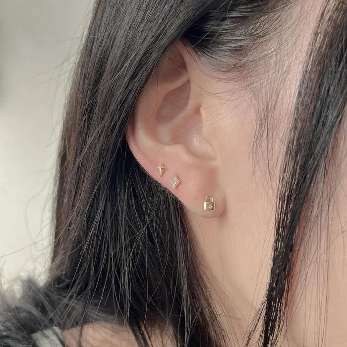 14k flash light cubic piercing