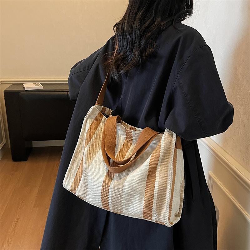 Korean version of canvas shoulder bag 2025 autumn and winter new literary stripes large-capacity student tote bag fashion shopping bag