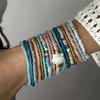 Bohemian bunte elastische Perlenarmbänder für Damen Handgefertigt Mehrschichtige dehnbare Kette Armreif Mädchen Urlaubs Schmuck