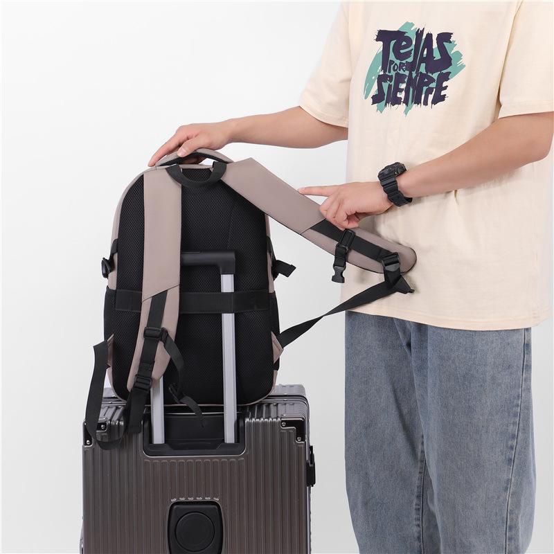 Versatile Men's Backpack: Trendy, Spacious, Lightweight Shoulder Bag for Business and School.