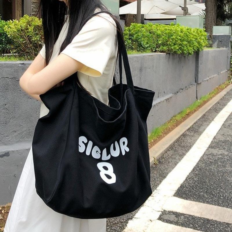 Spring and summer new printed canvas bag women's niche design large-capacity shoulder bag lazy atmosphere tote bag