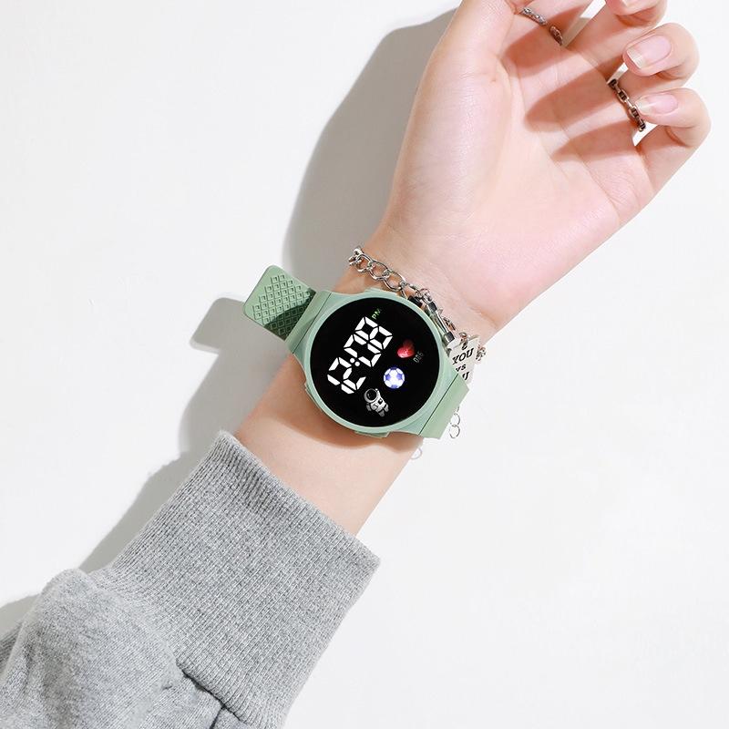 Popular And Stylish Round Electronic Watch For Children With Space Man Design High Tech And Trendy