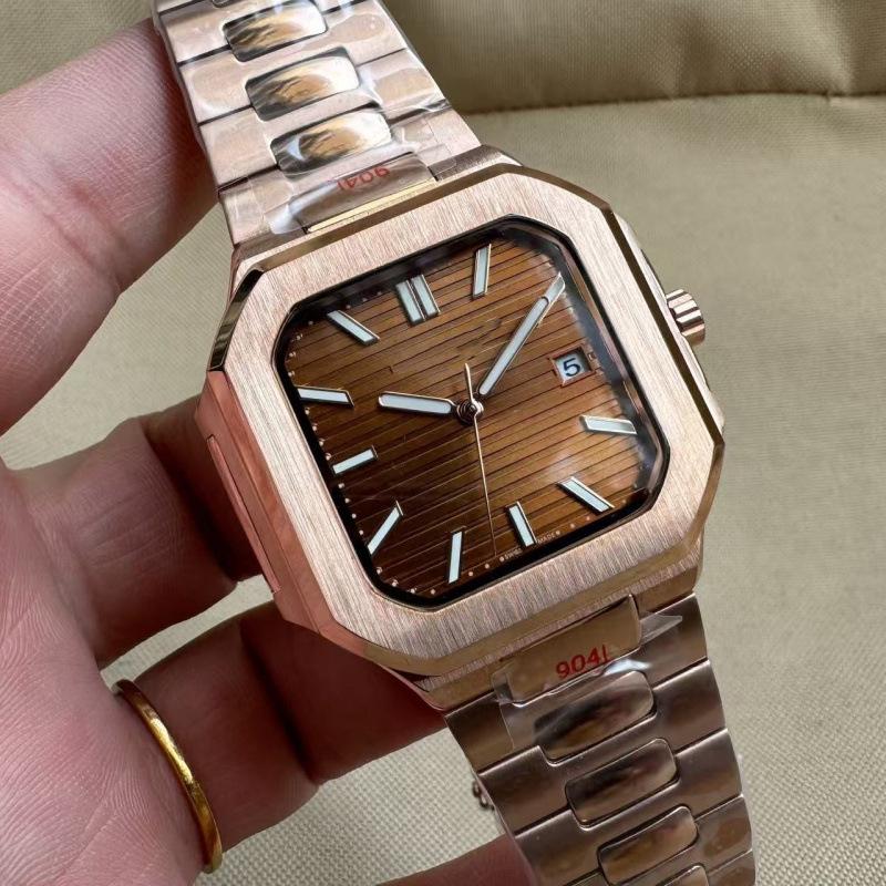 Patek Philippe Nautilus 5821 Men's Gold Automatic Mechanical Watch with Large Dial and Calendar.