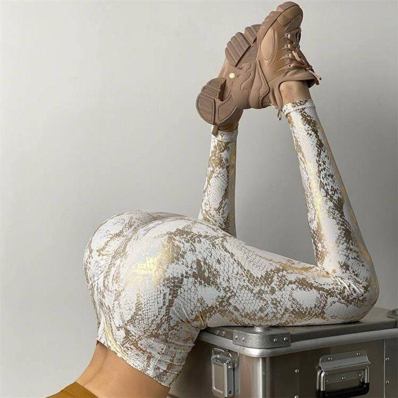 Pantaloni da Yoga Bronzanti Elasticizzati Stretti Moda Vento Elegante Fantasia Serpente Fianchi a Pesca Pantaloni Fitness Vita Alta Dimagranti Pantaloni Sportivi