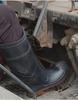 Golden Industrial Rain Boots: Oil, Acid & Alkali Resistant, Anti-Smash, Anti-Puncture, Flood-Proof Water Shoes with Rubber Steel Toe & Sole.