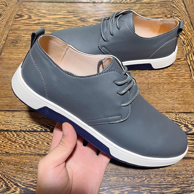 Men's British Style Summer Leather Shoes: Hollow Design, Large Size, Round Toe for Casual and Business Wear.