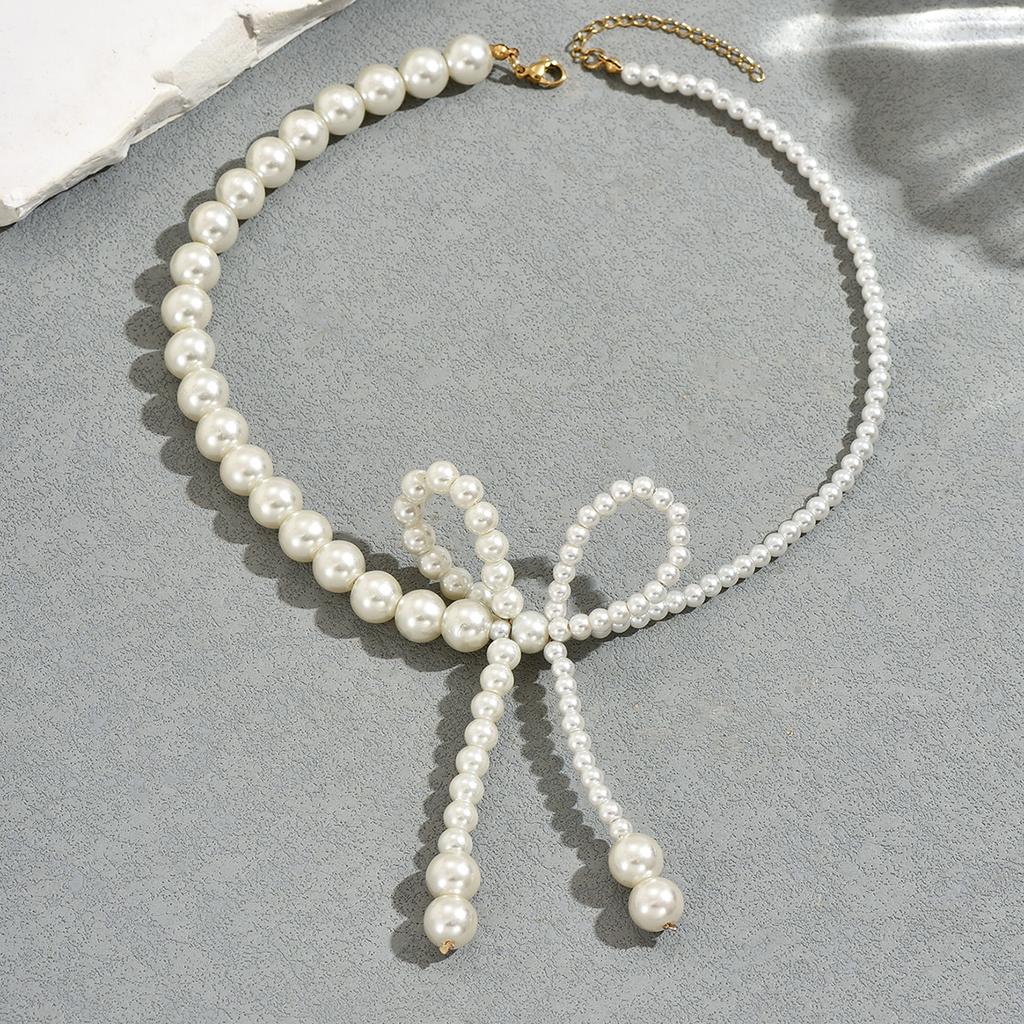 Collana girocollo con ciondolo fiocco perla bianca romantico, gradiente di dimensioni, nappa di perle sintetiche, gioielli per donna, da indossare per feste e matrimoni