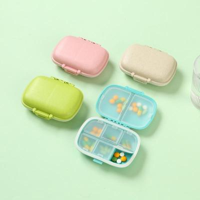 Moisture-proof 8-Compartment Pill Box: Portable Weekly Medicine Organizer.