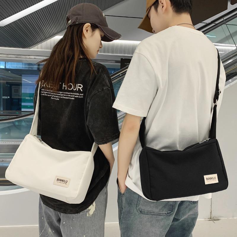 Trendy fashion letter simple sports canvas solid color shoulder bag retro student messenger bag bag
