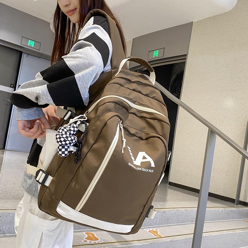 Simple student schoolbag Female high school student Junior high school student backpack Large capacity couple backpack