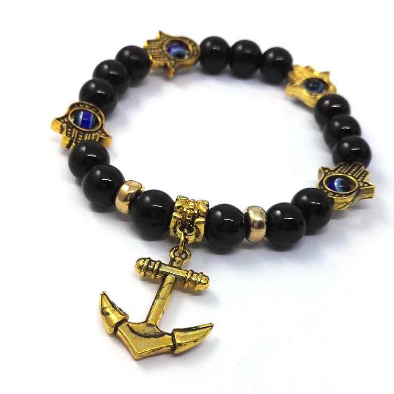 Versatile Bohemian Ethnic Bracelet with Lava Stone, Elephant, and Anchor Charms.